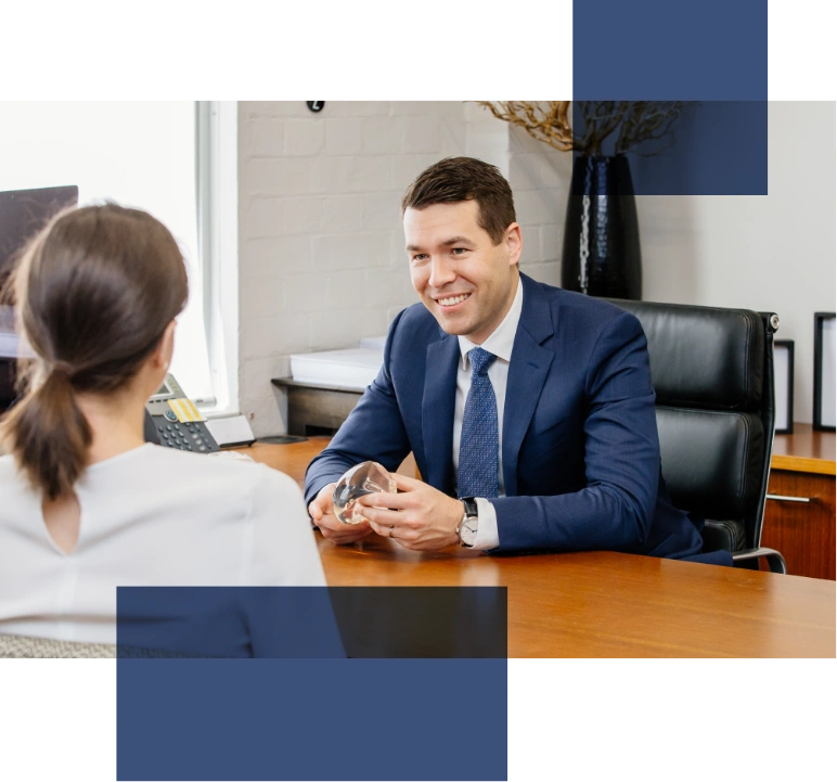 Dr Matthew Peters at consultation with a patient 01